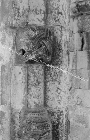 CASTLE RISING SAXON CARVINGS ON PILLAR OF WINDOW IN N. PASSAGE W. SIDE